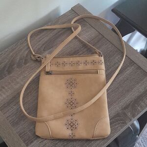 Crossbody bag zipper inside zippers outside and a zipper great condition like ne